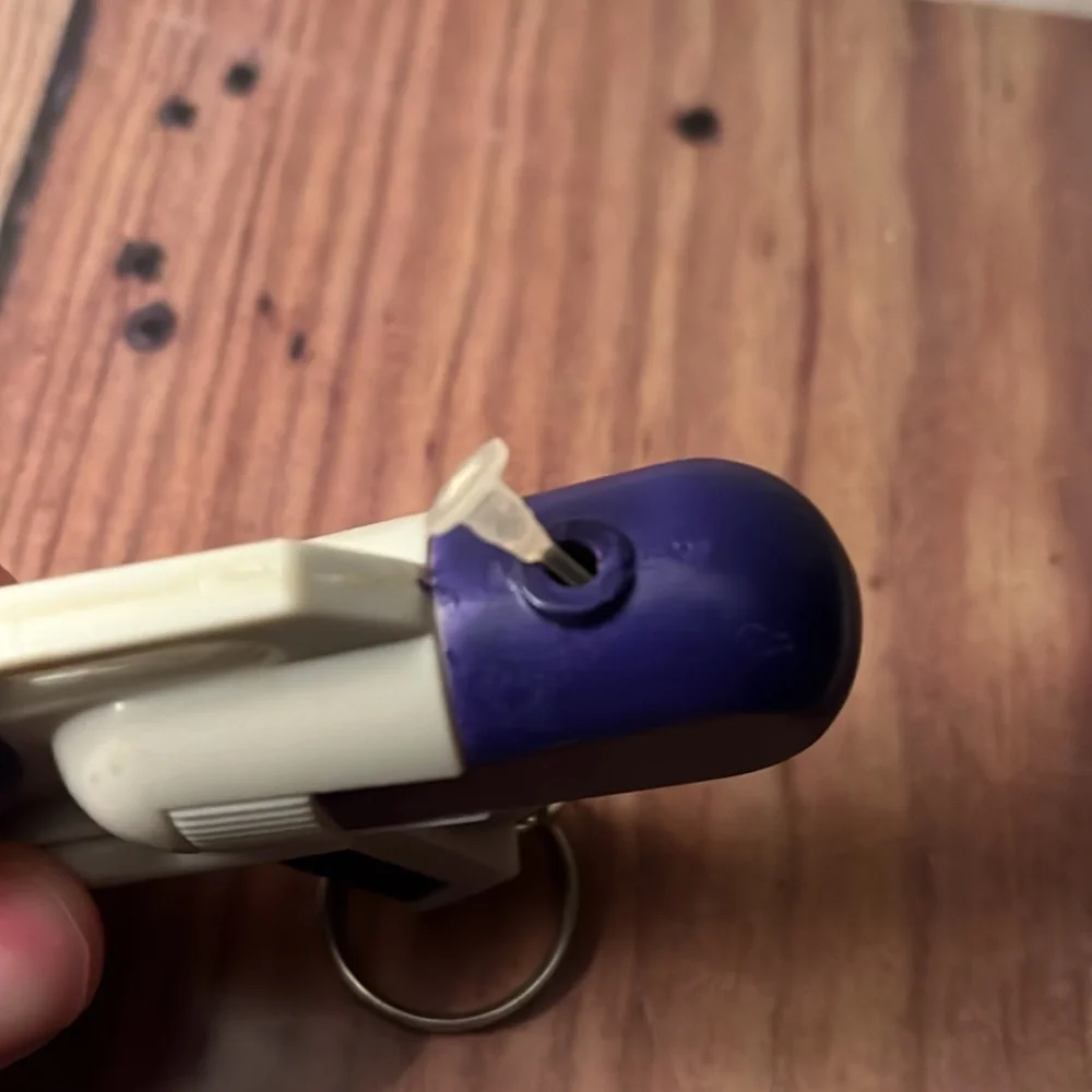 Vintage Soaker Water KeyChain 1998